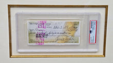 CARRIE FISHER SIGNED CHECK WITH HISTORIC PHOTOGRAPH