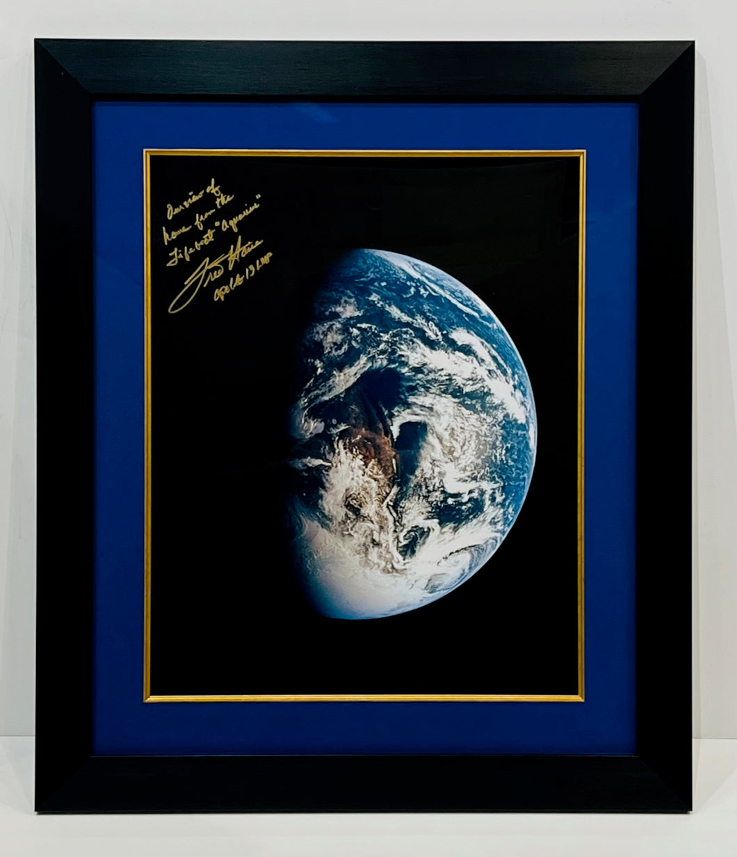 ASTRONAUT FRED HAISE  HAND-SIGNED AND INSCRIBED PHOTOGRAPH OF EARTH