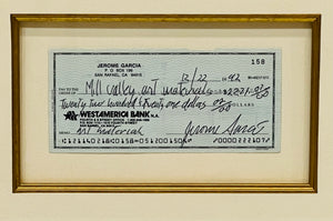HAND-SIGNED JERRY GARCIA CHECK WITH HISTORIC PHOTOGRAPH