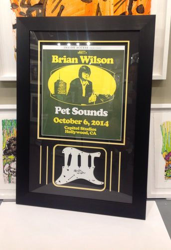 BRIAN WILSON SIGNED PICKGUARD WITH COMMEMORATIVE POSTER