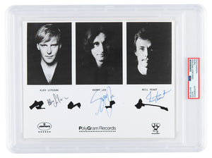 RUSH - POLYGRAM PUBLICITY PHOTOGRAPH HAND-SIGNED BY RUSH